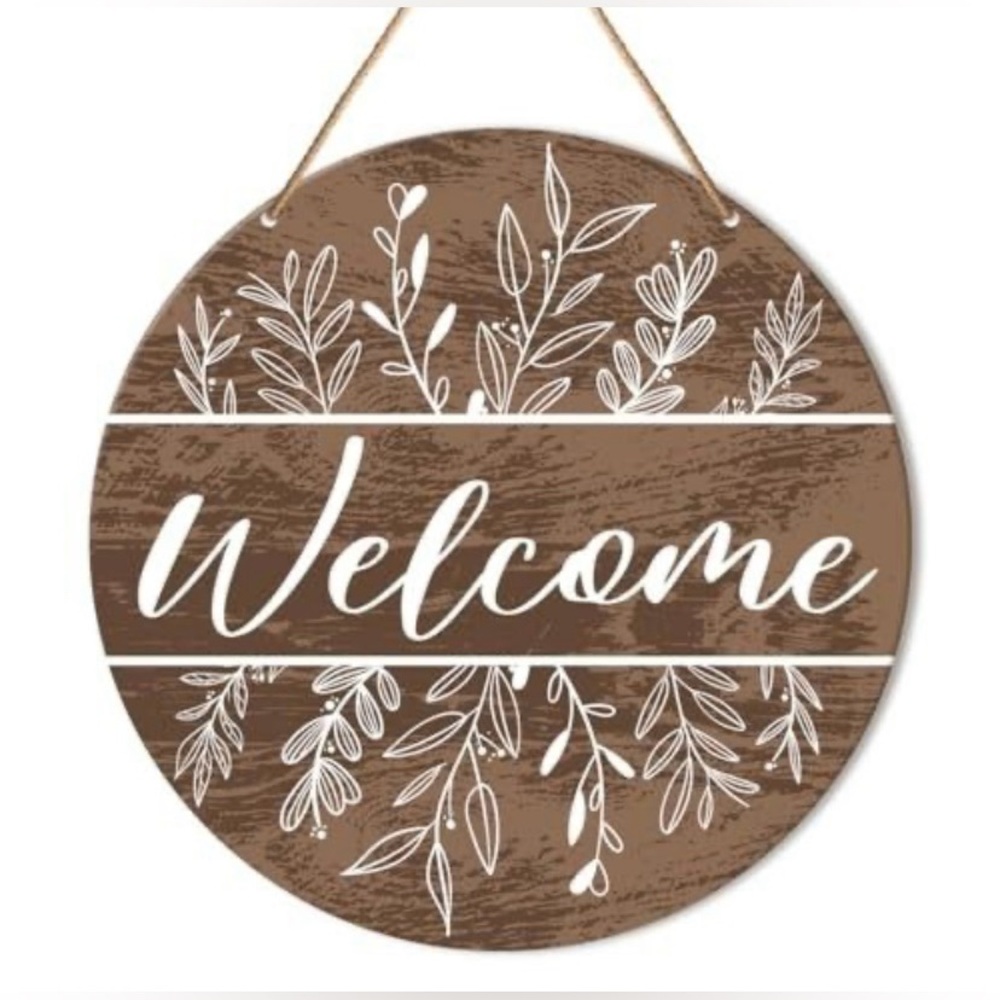 Brown Welcome Sign with White Leaf Design